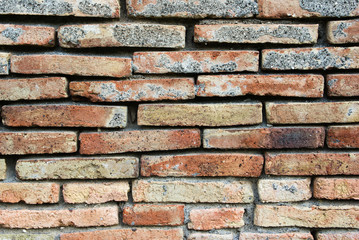 rows of horizontal red bricks worn