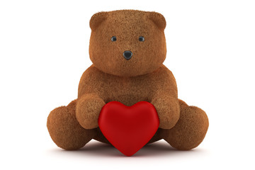 Valentine teddy bear holding a heart isolated on white