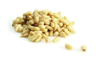 Pine nuts on white