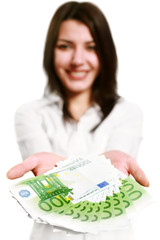 Happy young woman holding money