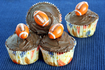 Chocolate cupcakes with footballs