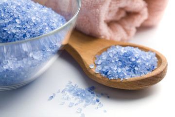 spa and body care background. herbal salt and towel