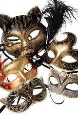 various carnival masks over white background