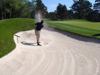 Golfer in trap