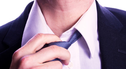 Man loosening tie