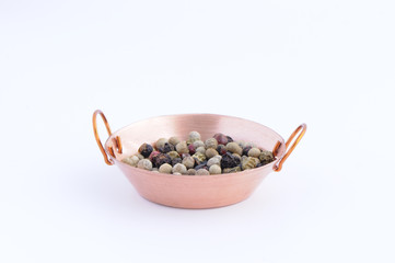 Sarten de cobre con especias