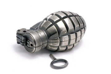 Silver color grenade lighter isolated on white background