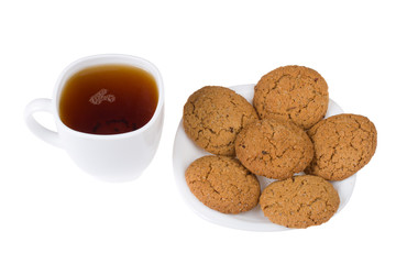 tea and five cookies on plate