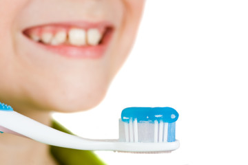 Child brushing teeth