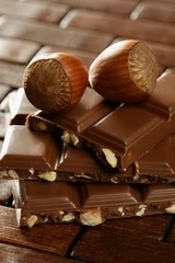 Hazelnuts and chocolate in brown enviroment