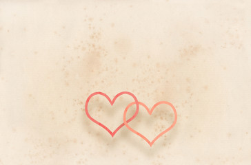 SFONDO RETRO CON COPPIA DI CUORI ALLACCIATI