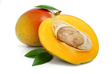 fresh mango fruit with green leafs isolated