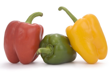 Multi colored peppers isolated on white