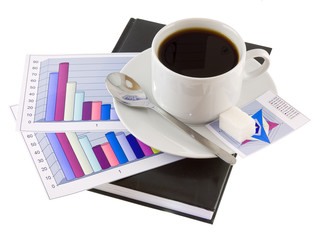 Coffee, standing on organizer, and  diagrams .Isolated.
