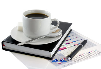 Coffee, standing on organizer, and  diagrams .Isolated.