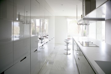 Fototapeta na wymiar big modern contemporary white kitchen