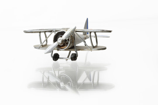 Isolated miniature model of nice vintage biplane