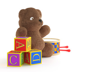 teddybear, building blocks, and drumb