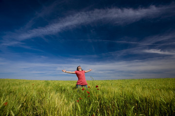 beautiful young woman happy in the nature