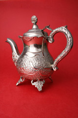 Elegant Kettle on Red Background