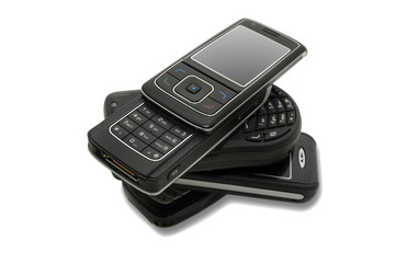 several cellphones isolated in white