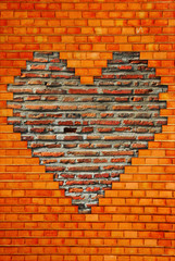 brick wall with heart shape of a bricks