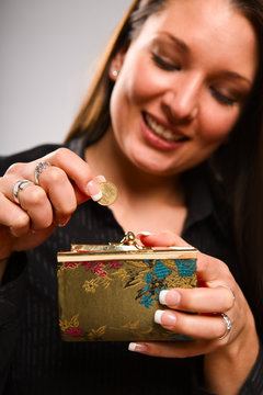 Woman Holding Coin Purse