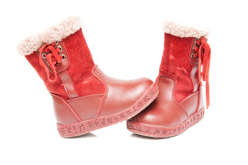 old red winter boots for baby isolated on white
