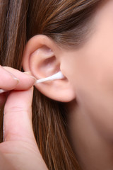 Woman Cleaning Ear