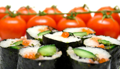 sushi and red tomatoes