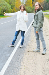 two girl on road