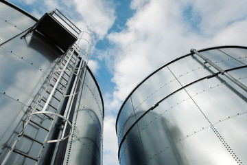 Refinery ladder and tanks