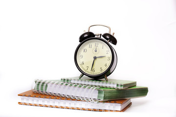 watch lay on notebooks