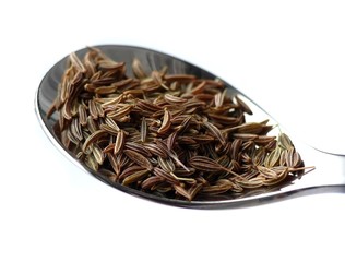 Caraway seed on spoon