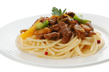Pasta with meat and vegetables isolated on white background