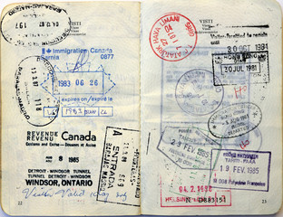 Italian passport. Canada visa, Hong Kong, Tahiti stamps - 11586597