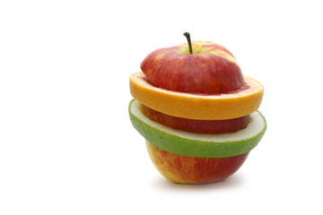 grapefruit and apple isolated on a white background