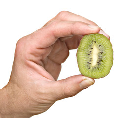 hand holding a section of kiwi fruit