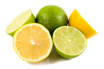 Obraz na płótnie Canvas Lemons and Limes with leaves on white