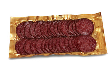 Sausage in vacuum package on white.