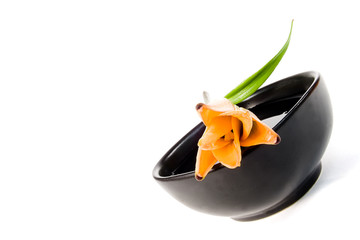 flower on a bowl of water