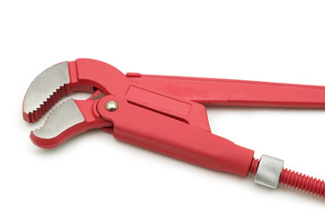 red big spanner on white background