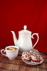 beautiful still life cup of tea and some delicious pastries..