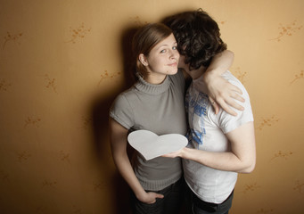 New couple enclosing one another