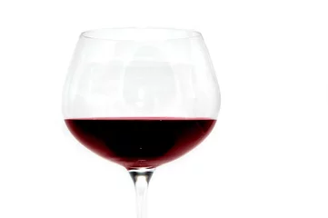 Fotobehang A Glass of red wine © Blaz Kure
