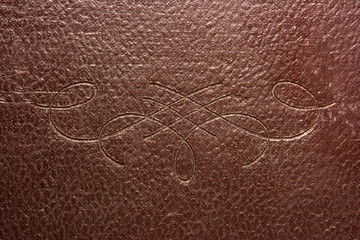 Part of cover of antique book.