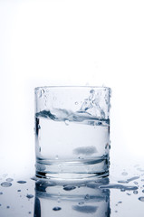 Glass of splashing water