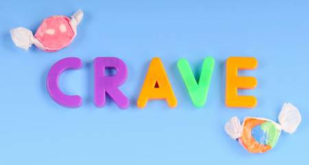 Magnetic letters spelling crave
