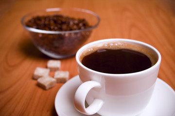 cup of coffee, sugar and beans