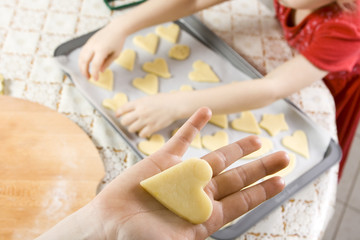 Obraz na płótnie Canvas children making cookies